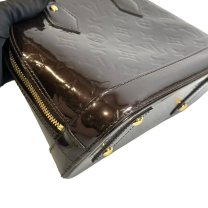 Used LOUIS VUITTON Patent Alma Cross body bag Amarante