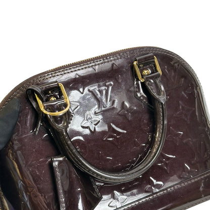 Used LOUIS VUITTON Patent Alma Cross body bag Amarante