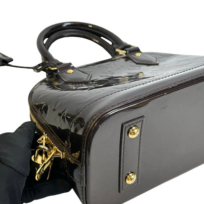 Used LOUIS VUITTON Patent Alma Cross body bag Amarante