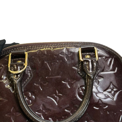 Used LOUIS VUITTON Patent Alma Cross body bag Amarante
