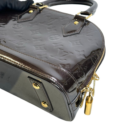 Used LOUIS VUITTON Patent Alma Cross body bag Amarante