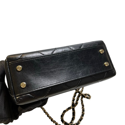 Used CHANEL Quilted Lambskin Mini flap bag with top handle Mini Bag Black Gold tone hardware