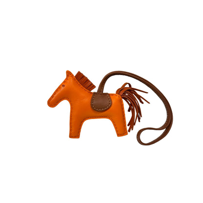 Unused Hermès Milo leather Rodeo PM Accessories Orange